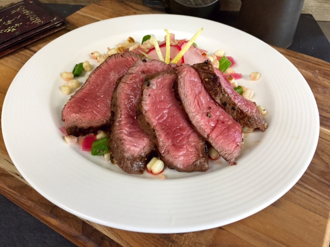 Sliced Top Sirloin Steak Tower with Pickled Radish and Corn Salad